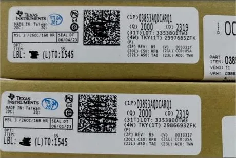 Two stacked cartons with white Texas Instruments labels reading O3853AQDCARQ1, quantity 2000, date codes 2319