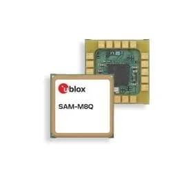 Two small square u-blox SAM-M8Q modules, one showing its label on top and one its green circuit board with pads underneath