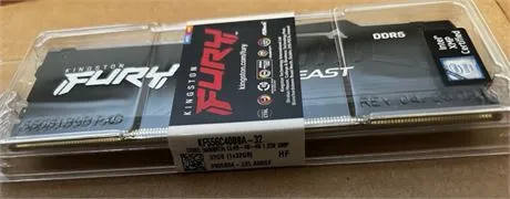 Kingston Fury DDR5 memory module sealed in clear plastic packaging with a product label across the middle